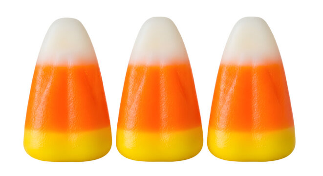 Three pieces of classic tricolor candy corn isolated on transparent background