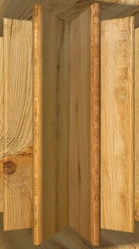 Natural Southern Yellow Pine wooden boards rotating continuously with visible grain, organic texture, refined surfaces and timber character