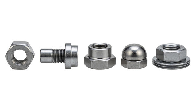 Set of various metal nuts and bolts isolated on white background for industrial hardware