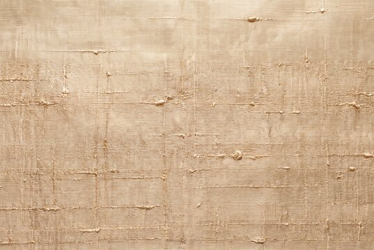 Raw silk fabric with irregular slub threads and soft golden sheen