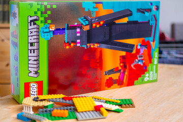 Fototapeta premium LEGO Minecraft box, multicolored plastic bricks, Colorful toy set, building blocks, development fine motor skills, play time, creative activity product detail, brand identity, creating something new