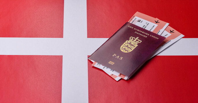 Denmark, Danish passport or id document with tickets for flight, travel. Danish passport