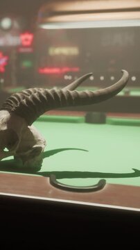 A skull with long horns rests on a green felt pool table. The background shows a bar scene with dim lighting and colorful signs. The atmosphere looks lively yet shadowy.