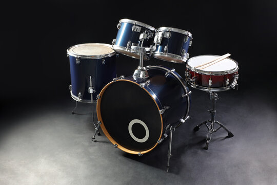 Drum set on black background. Musical instrument
