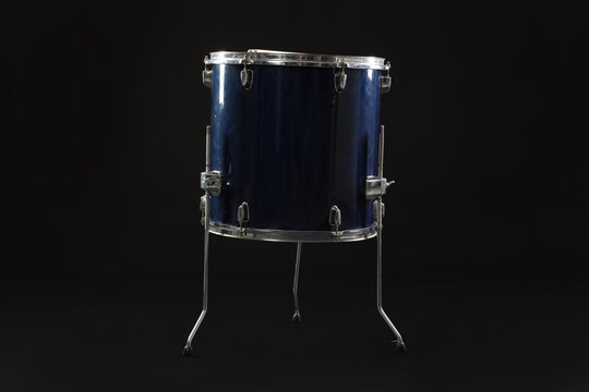 Floor drum on black background. Musical instrument