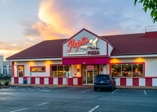 Oneida, NY - Jul 13, 2026: Twilight exterior view of Pepi&rsquo;s Pizza restaurant, a locally known restaurant famous for coal-fired pizza and deli food