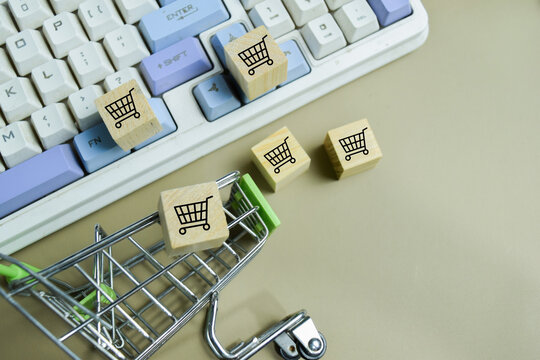 Concept of online shopping cart cardboard box retail sale commerce. For delivery service e commerce market basket purchase.