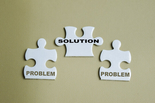Piece of jigsaw puzzle with problem and solution.