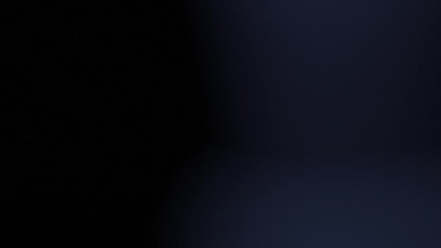 Abstract dark blue gradient background with smooth light flash transition