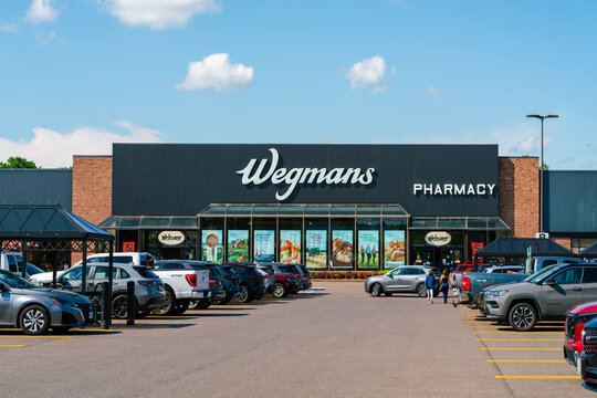 Liverpool, NY - Aug 13, 2026: Exterior view of Wegmans grocery store and pharmacy located at Taft Road Plaza, an American supermarket and pharmacy chain with over 110 locations nationwide