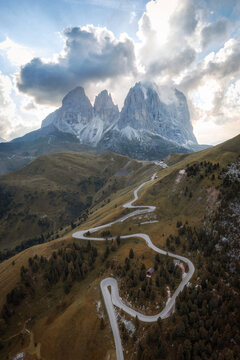 Winding mountain road leading to Passo Sella in Italy 2024