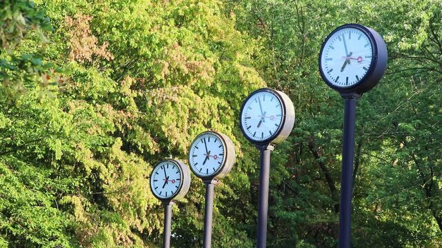 Many clocks or many analog clocks show parallel work and team coordination in global collaboration and international collaboration. Synchronous clocks for time keeping in project management projects.