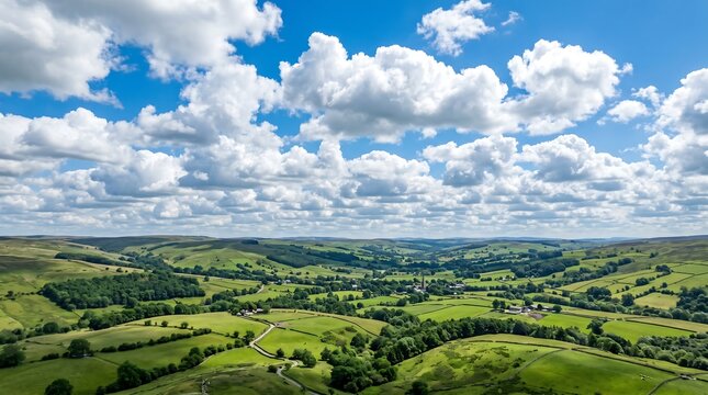 British summertime cumulus clouds over rolling green hills - bright optimistic sky, Premium Nature Stock Photography Capture.