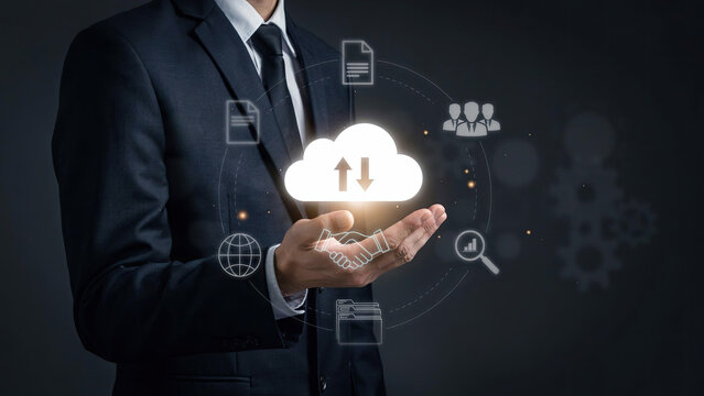 Businessman holding glowing digital cloud interface representing global storage data solutions for corporate enterprise network systems