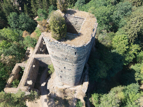 Drone view photo ruin of Gut&scaron;tein castle, on the rock-bound over the stream Hadovka. Founded around 1300.