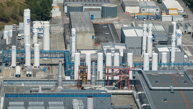 Crolles, France - 01 August 2026: Aerial view of the Air Liquide industrial gas facility at the STMicroelectronics campus, showing cryogenic storage tanks and industrial infrastructure.
