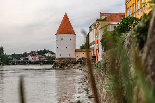 Panoramic view Schaibling Tower and promenade on river Inn, Passau, Lower Bavaria, Germany.