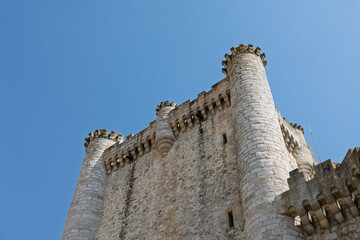 Tiedra castle displaying medieval architecture under blue sky © Azulblue