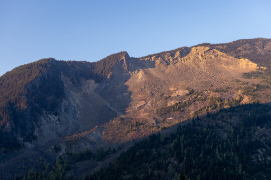 Sunlit Hope Slide Mountain Slope and Landslide Scar Above Hope, BC Canada at Golden Hour