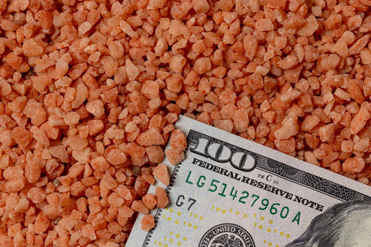 Potash potassium fertilizer and cash money. Farm fertilizer supply, gardening and agriculture tariffs concept.