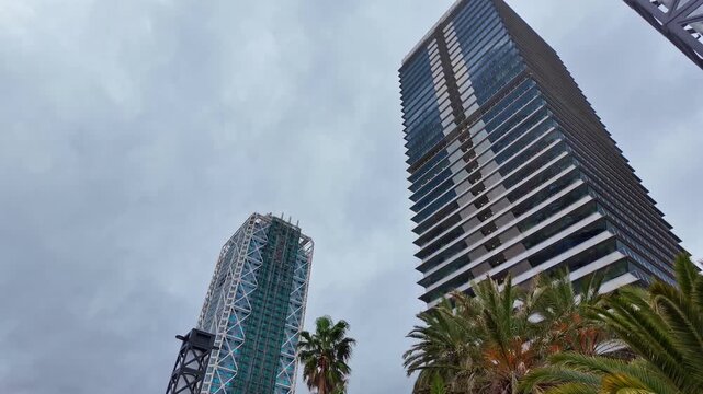 Low angle view of modern Hotel Arts and Torre Mapfre skyscrapers in Barcelona, Spain