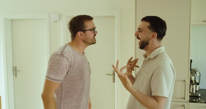 Two men argue face to face during a heated discussion, expressing disagreement and frustration. Concept of interpersonal conflict, communication problems, and emotional tension.