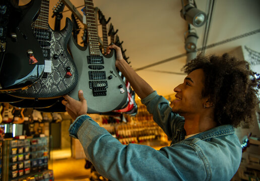 Selecting Electric Guitar.