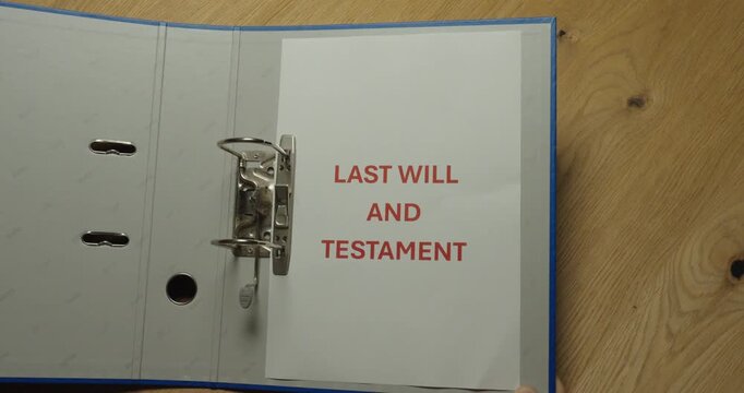 Close-up of a Last Will and Testament document in a binder. Ideal for inheritance, estate planning, legal documents and family affairs.