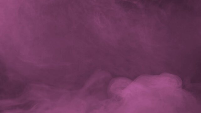 Soft pink fog cloud rolling along bottom edge on dark black background
