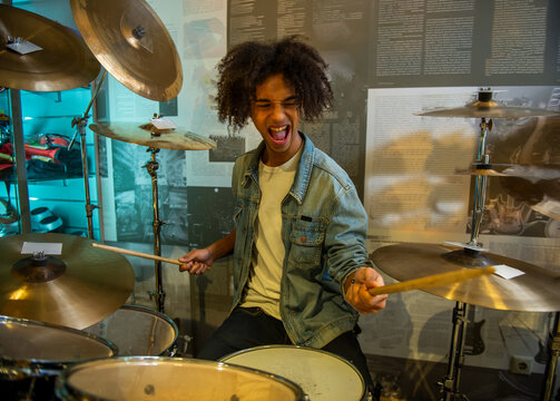 Energetic Drummer Performance.