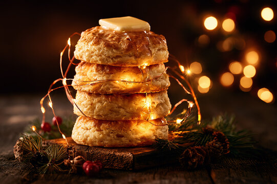 biscuit stack wrapped in glowing Christmas fairy lights