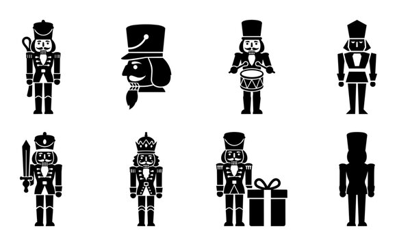 Set of traditional wooden nutcracker soldier black silhouettes icons for Christmas design elements.