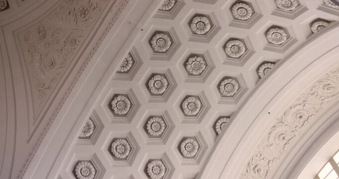 Ornate coffered ceiling with floral motifs inside Imperia Basilica, Italian Riviera