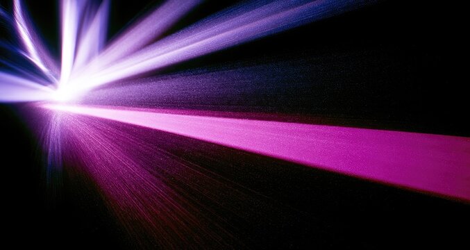 Bright, dynamic light burst with purple and pink rays against black