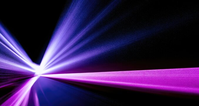 Exploding light streaks in purple and blue against black