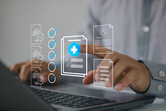 Digital healthcare compliance concept. A professional selects verified medical documents and checklists on laptop, symbolizing secure records, approval, quality control, online health administration.