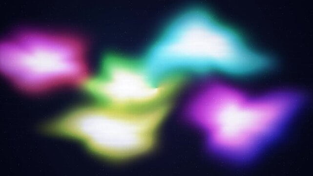 Abstract, amorphous colorful light blobs resembling an aurora borealis shift smoothly on a dark, starry background.