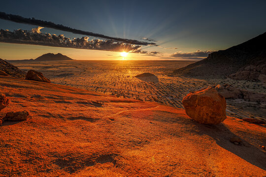 Desert mountain landscape at sunrise, copy space, Spitskoppe