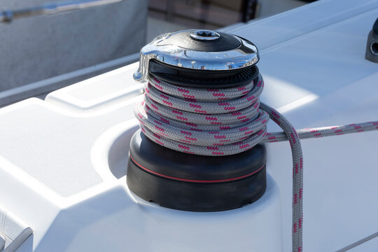 Sailing boat equipment at a marina on a sunny day