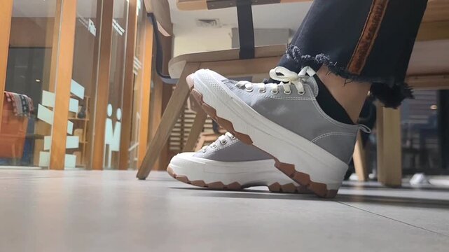 A tap from a shoe on the floor.