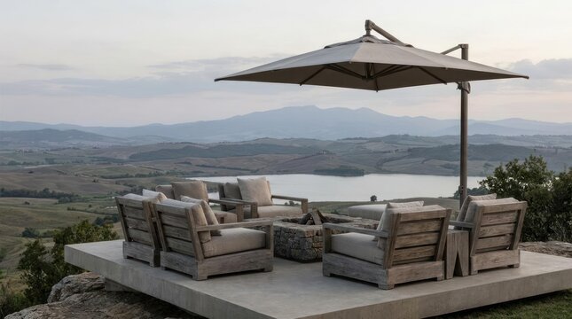 Outdoor patio furniture set overlooking mountain landscape.