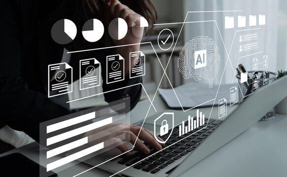 A professional working on a laptop with digital overlays showcasing business analysis, artificial intelligence, and data visualization for modern office productivity. Gantry