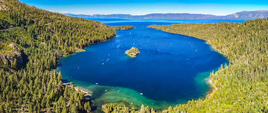 Boats rest in Emerald Bay Lake Tahoe waters