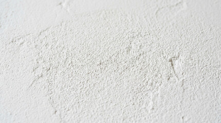 Fototapeta premium Textured White Plaster Surface Close-up Macro Background