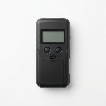 Hand holding a stud finder on a plain background