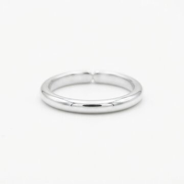 Silver toe ring on white background