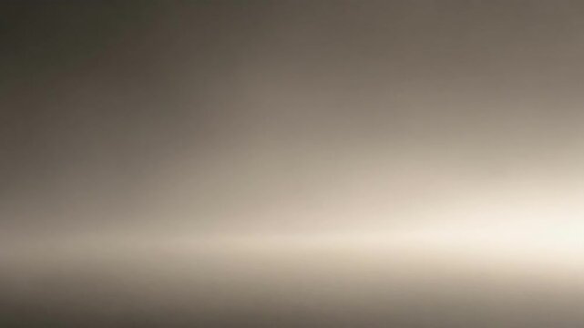 Blurred gradient background with soft brown and beige tones