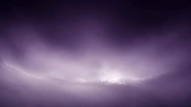 Dark cloudy sky with purple and gray hues