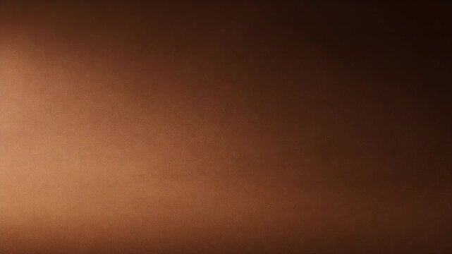 Smooth gradient background transitioning from dark brown to light brown