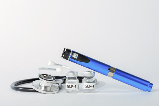 Professional medical injection blue pen stethoscope glp 1 vial medicine bottle setup representing hope clinical recovery healthcare relief